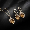 image:imageEVEVIC Austrian Crystals Teardrop Hollow Twisted Pendant Necklace Earrings for Women 14K Gold Plated Halo Drop Dangle Earrings Hypoallergenic Jewelry SetLight Topaz