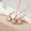 image:imageEVEVIC Austrian Crystals Teardrop Hollow Twisted Pendant Necklace Earrings for Women 14K Gold Plated Halo Drop Dangle Earrings Hypoallergenic Jewelry SetClear White