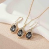 image:imageEVEVIC Austrian Crystals Teardrop Hollow Twisted Pendant Necklace Earrings for Women 14K Gold Plated Halo Drop Dangle Earrings Hypoallergenic Jewelry SetGreyBlack