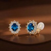 image:imageEVEVIC Oval Austrian Crystal Halo Clip On Earrings for Women  Oval Austrian Crystal with Zircon Halo14K GoldPlatedSilicone Comfort PadGift Box IncludedFor Daily and Evening EventsDark Blue