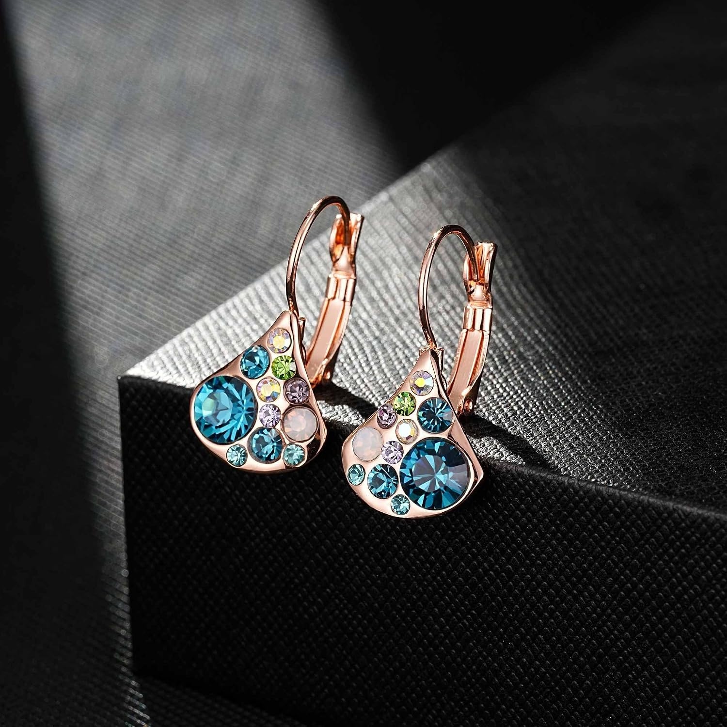 image:imageAustrian Crystal Multicolored Pear Dangle Drop Earrings for Women  14K gold plated brasscolorful crystalleverback claspgift boxPearshaped designBlue Green CrystalsRose Goldtone