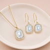 image:imageEVEVIC Octagon Austrian Crystal Necklace and Earrings Jewelry Set for Women  14K GoldPlatedOctagonCut Crystal with CZ Halo ShineAdjustable Chain FitElegant Sets for Weddings and GalasGift BoxClear White