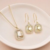 image:imageEVEVIC Octagon Austrian Crystal Necklace and Earrings Jewelry Set for Women  14K GoldPlatedOctagonCut Crystal with CZ Halo ShineAdjustable Chain FitElegant Sets for Weddings and GalasGift BoxLight Topaz