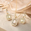 image:imageEVEVIC Octagon Austrian Crystal Necklace and Earrings Jewelry Set for Women  14K GoldPlatedOctagonCut Crystal with CZ Halo ShineAdjustable Chain FitElegant Sets for Weddings and GalasGift BoxLight Topaz