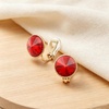 image:imageEVEVIC Round Austrian Crystal Clip On Earrings for Women  14K Gold PlatedSilicone Comfort PadPerfect for Dance Competitions and PromsGift Box IncludedRed