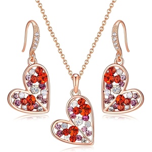 image:imageAustrian Crystal Heart Pendant Necklace Earrings Jewelry Sets for Women  Colorful Crystal14K rose gold plated brassCute heartshaped designgift box162 adjustable chainwomens jewelry setRed Main CrystalRose Goldtone