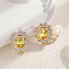 image:imageOval Austrian Crystal Halo Clip On Earrings for Women  Oval Austrian Crystal with Zircon Halo14K GoldPlatedSilicone Comfort PadGift Box IncludedFor Daily and Evening EventsYellow