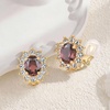 image:imageOval Austrian Crystal Halo Clip On Earrings for Women  Oval Austrian Crystal with Zircon Halo14K GoldPlatedSilicone Comfort PadGift Box IncludedFor Daily and Evening EventsAntique Pink