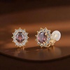 image:imageOval Austrian Crystal Halo Clip On Earrings for Women  Oval Austrian Crystal with Zircon Halo14K GoldPlatedSilicone Comfort PadGift Box IncludedFor Daily and Evening EventsAntique Pink